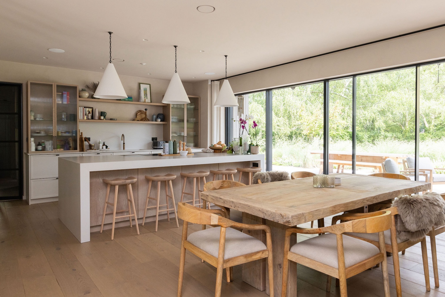 The Fluid X: an ultra-minimal sliding door from Fluid Glass with 21mm sightlines and 6m panels