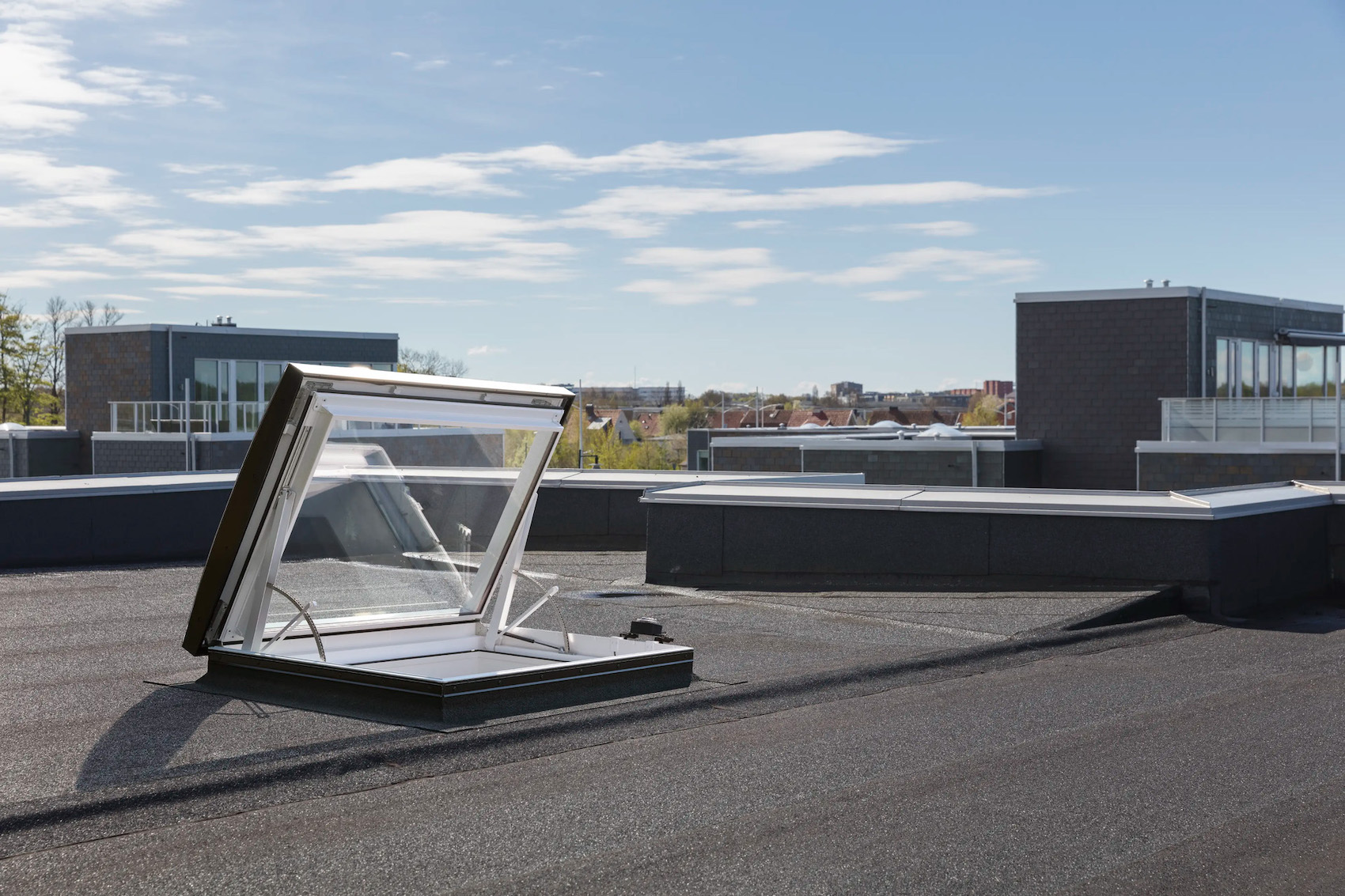 VELUX Glass Rooflight Electric Roof Exit: Safe and seamless flat roof access